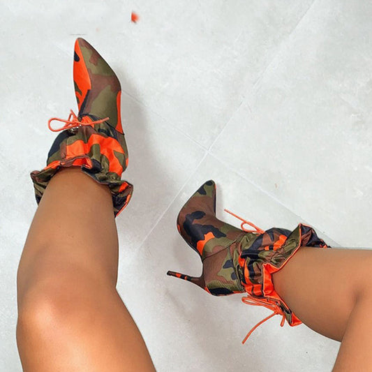 Middle tube high heel pointed boots